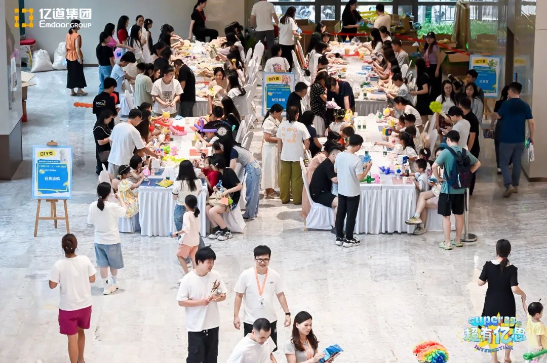 Employees craft colorful bags and pressed-flower fans in the DIY zone, showcasing their creativity.