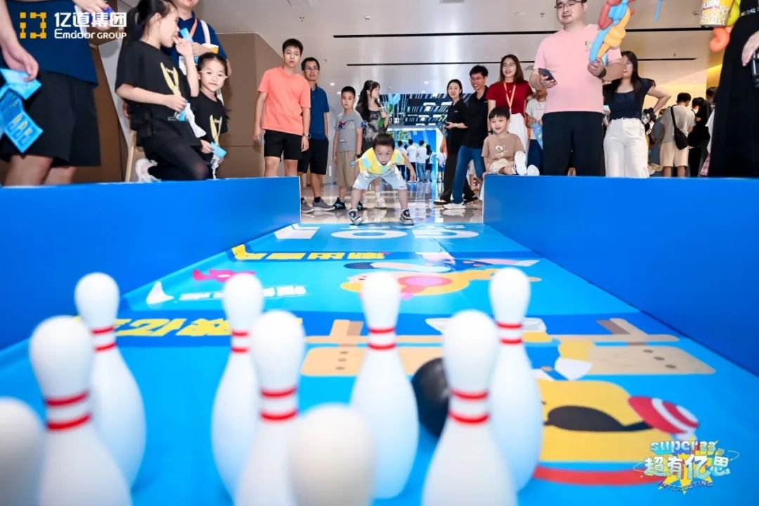 The rooftop garden transforms into a game paradise with duck-catching and bowling challenges.