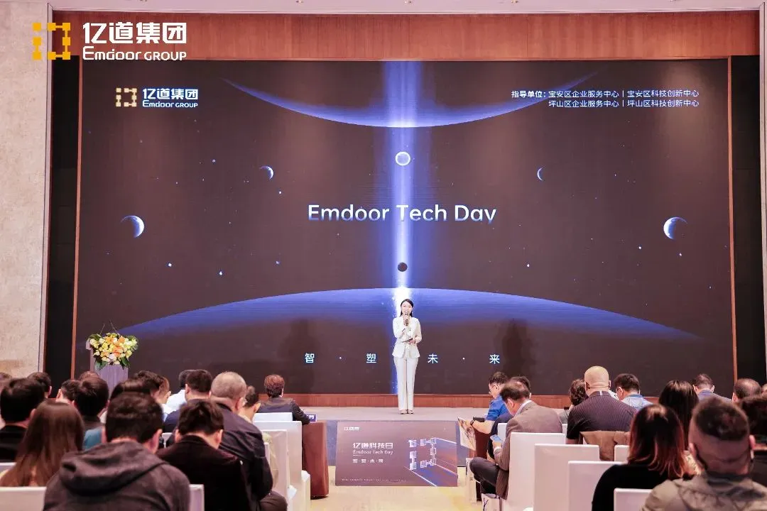 Host presenting on stage at Emdoor event